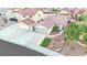 Well-maintained single-Gathering home with a two-car garage, lovely landscaping, and mature trees at 585 Jackson Dr, Henderson, NV 89014