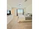 Bright bedroom with neutral colors, carpet, and abundant natural light creating a relaxing space at 6840 Sunflower Fields St, North Las Vegas, NV 89086