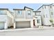 Beautiful two-story home with a covered entry, attached garage, and minimalist landscaping at 6840 Sunflower Fields St, North Las Vegas, NV 89086