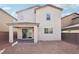 The backyard features a covered patio, block wall surround and space for customizations at 6844 Bayou Hollow Ave, Las Vegas, NV 89156