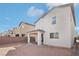 The home's backyard features a covered patio and block wall with room for custom landscaping at 6844 Bayou Hollow Ave, Las Vegas, NV 89156
