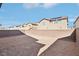This backyard area is surrounded by a block wall and offers plenty of space for customization at 6844 Bayou Hollow Ave, Las Vegas, NV 89156