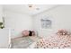 Bright bedroom featuring a window and twin bed with a patterned coverlet at 6844 Bayou Hollow Ave, Las Vegas, NV 89156