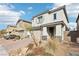 Attractive two-story house featuring a brick driveway, desert landscaping, and attached two-car garage at 6844 Bayou Hollow Ave, Las Vegas, NV 89156