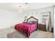 Main bedroom features a stylish chandelier and bright natural lighting at 6844 Bayou Hollow Ave, Las Vegas, NV 89156