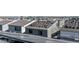 View of new neighborhood construction with roof tiles being installed at 8144 Monsoon Bay St, Las Vegas, NV 89113