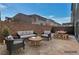Inviting backyard patio area with comfortable seating arrangements, perfect for outdoor relaxation and entertainment at 8144 Monsoon Bay St, Las Vegas, NV 89113
