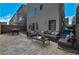 This backyard features a cozy patio, comfortable seating, and plenty of space for entertaining at 8144 Monsoon Bay St, Las Vegas, NV 89113