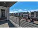 View from the balcony of modern home with street view at 8144 Monsoon Bay St, Las Vegas, NV 89113