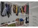 Walk-in closet providing ample storage with shelves, hanging rods, drawers, and organized clothing and accessories at 8144 Monsoon Bay St, Las Vegas, NV 89113