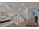 Bright hallway featuring white wainscotting, a bench, and easy access to other areas of the home at 8144 Monsoon Bay St, Las Vegas, NV 89113