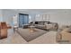Inviting living room features a comfortable sofa, a stylish coffee table, and plenty of space to relax at 8144 Monsoon Bay St, Las Vegas, NV 89113