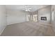 Large bedroom featuring neutral-colored walls, carpet and a fireplace at 8904 Saint Pierre Dr, Las Vegas, NV 89134