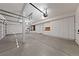A spacious three car garage with ample storage cabinets at 8904 Saint Pierre Dr, Las Vegas, NV 89134