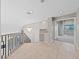 Bright hallway with views to a bedroom, featuring marble floors, neutral walls, and a chandelier at 8904 Saint Pierre Dr, Las Vegas, NV 89134