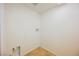 Empty laundry room with tile floors and good lighting at 9257 Harbor Stream Ave, Las Vegas, NV 89149