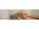 Carpeted staircase with wood railing at 9257 Harbor Stream Ave, Las Vegas, NV 89149