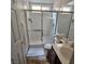 Clean bathroom has glass shower and sink, perfect for guests at 1009 Rustridge Ave, North Las Vegas, NV 89081