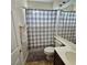 Cozy bathroom features shower and sink, perfect for or guests at 1009 Rustridge Ave, North Las Vegas, NV 89081