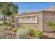 A brick community sign identifying Geyser Peak, enhanced by lush greenery and meticulous landscaping at 1009 Rustridge Ave, North Las Vegas, NV 89081
