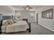 Inviting main bedroom with plush carpeting, elegant furniture, and serene atmosphere at 1009 Rustridge Ave, North Las Vegas, NV 89081