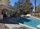 A beautiful pool and patio area with a large backyard at 12 Innisbrook Ave, Las Vegas, NV 89113