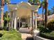 Elegant home showing stately columns, lush landscaping, and attractive entryway at 12 Innisbrook Ave, Las Vegas, NV 89113