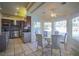 Eat-in kitchen with stainless steel appliances, granite counters, and a breakfast nook at 12 Innisbrook Ave, Las Vegas, NV 89113