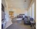 Bright open main bedroom, featuring light wood floors and a sitting area at 12 Innisbrook Ave, Las Vegas, NV 89113