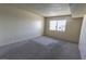 Comfortable bedroom with plush carpet and a window offering natural light at 1405 E Vegas Valley Dr # 112, Las Vegas, NV 89169