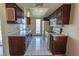Well-lit kitchen features white appliances, ample counter space, and white tiled floors at 1405 E Vegas Valley Dr # 112, Las Vegas, NV 89169