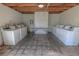 The laundry room is equipped with several large washing machines for residents to use at 1405 E Vegas Valley Dr # 112, Las Vegas, NV 89169