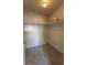 Spacious walk-in closet with neutral carpeting and plenty of shelf storage at 1405 E Vegas Valley Dr # 112, Las Vegas, NV 89169