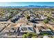 This home features a nice aerial view of the surrounding neighborhood and desert landscape at 1500 Saylor Way, Las Vegas, NV 89108