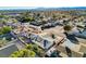 An aerial view showcases the neighborhood and mountain backdrop of this residence at 1500 Saylor Way, Las Vegas, NV 89108