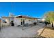 This home features a large backyard with a covered patio and plenty of space for outdoor entertaining at 1500 Saylor Way, Las Vegas, NV 89108