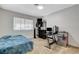 Bedroom featuring a large window, carpet, and an air conditioning unit at 1500 Saylor Way, Las Vegas, NV 89108
