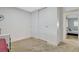 Neutral bedroom with carpet flooring, closet, and adjacent room at 1500 Saylor Way, Las Vegas, NV 89108