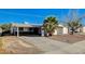 Charming single-story home with a large driveway and desert landscaping at 1500 Saylor Way, Las Vegas, NV 89108