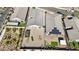 Aerial view of two homes showcasing backyard landscaping and desert vegetation at 2255 Woodbluff Ave, North Las Vegas, NV 89086