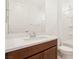 Bathroom featuring a modern vanity and a shower-tub combo at 2255 Woodbluff Ave, North Las Vegas, NV 89086