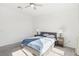 Cozy bedroom with a ceiling fan, a soft color palette, and plenty of natural light at 2255 Woodbluff Ave, North Las Vegas, NV 89086