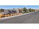 Del Webb North Ranch community entrance sign surrounded by desert landscaping, creating a welcoming curb appeal at 2255 Woodbluff Ave, North Las Vegas, NV 89086