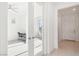 Hallway with double doors to a sun room and a view of the home entrance at 2255 Woodbluff Ave, North Las Vegas, NV 89086