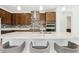 Modern eat-in kitchen featuring granite countertops, a large island, and stainless steel appliances at 2255 Woodbluff Ave, North Las Vegas, NV 89086