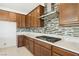 Well-appointed kitchen with a gas range, sleek countertops, and ample cabinet space at 2255 Woodbluff Ave, North Las Vegas, NV 89086