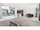 Spacious living room with an open floor plan view of the kitchen and dining area at 2255 Woodbluff Ave, North Las Vegas, NV 89086
