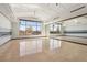 Bright studio with hardwood floors, mirrors, high ceilings, and large windows overlooking the neighborhood at 2255 Woodbluff Ave, North Las Vegas, NV 89086