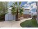 Well-maintained backyard with storage shed and mature landscaping, perfect for outdoor enjoyment at 23 Crescent Palm Ct, Henderson, NV 89002