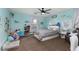 This colorful bedroom offers a bed, shelving, and window for lots of light and storage at 23 Crescent Palm Ct, Henderson, NV 89002